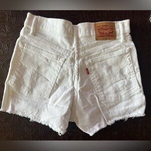 White Levi distressed shorts